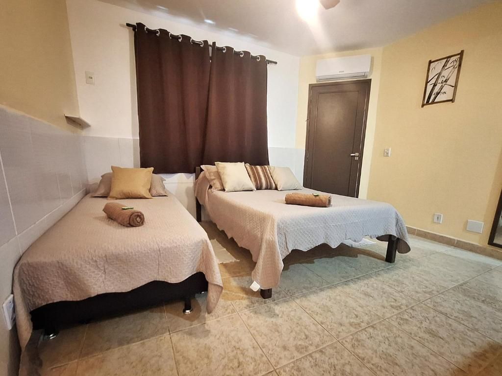 Habitación Cuádruple Deluxe — Pousada do Coco